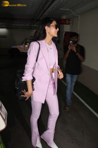 actress Jacqueline Fernandez stylish in a pink pant suit at mumbai airport