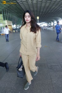 actress janhvi kapoor in brown overalls at airport