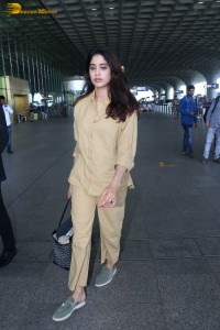 actress janhvi kapoor in brown overalls at airport