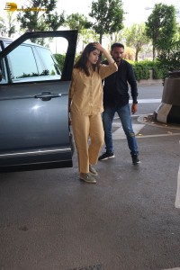 actress janhvi kapoor in brown overalls at airport