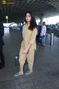 actress janhvi kapoor in brown overalls at airport