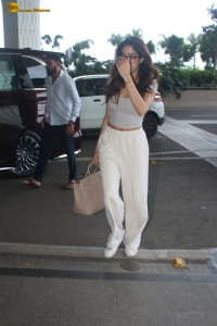 bollywood actress janhvi kapoor cute looks in a grey top at mumbai airport