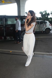bollywood actress janhvi kapoor cute looks in a grey top at mumbai airport