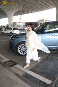 Bollywood Actress Janhvi Kapoor in a white salwar dress