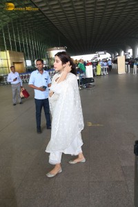 Bollywood Actress Janhvi Kapoor in a white salwar dress