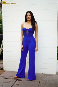 Bollywood Actress Janhvi Kapoor in a blue shoulderless dress