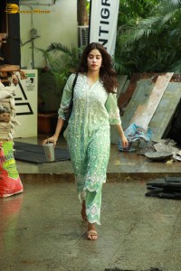 Bollywood Actress Janhvi Kapoor in a green salwar dress