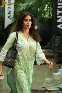 Bollywood Actress Janhvi Kapoor in a green salwar dress