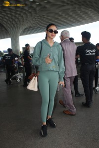 Indian actress Jasmin Bhasin in green overalls spotted at airport