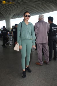 Indian actress Jasmin Bhasin in green overalls spotted at airport