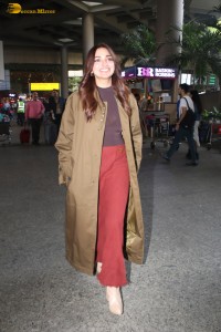 actress jiya shankar cute in a red thigh skirt and brown jacket