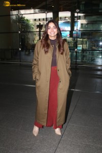 actress jiya shankar cute in a red thigh skirt and brown jacket