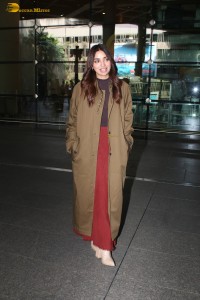 actress jiya shankar cute in a red thigh skirt and brown jacket