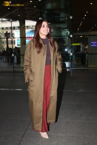 actress jiya shankar cute in a red thigh skirt and brown jacket