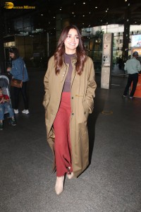 actress jiya shankar cute in a red thigh skirt and brown jacket