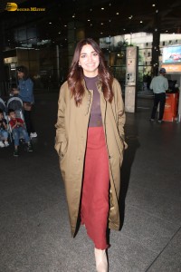 actress jiya shankar cute in a red thigh skirt and brown jacket
