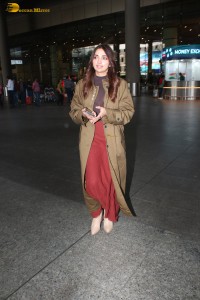 actress jiya shankar cute in a red thigh skirt and brown jacket