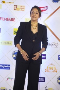 telugu and tamil actress Jyothika stylish looks in a black pantsuit at filmfare awards