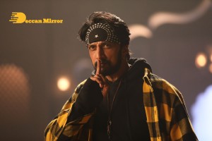 Stills from the movie K3 Kotikokkadu starring Sudeep and Madonna Sebastian