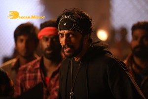 Stills from the movie K3 Kotikokkadu starring Sudeep and Madonna Sebastian