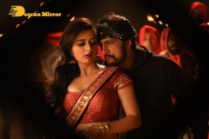 Stills from the movie K3 Kotikokkadu starring Sudeep and Madonna Sebastian