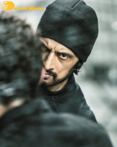 Stills from the movie K3 Kotikokkadu starring Sudeep and Madonna Sebastian