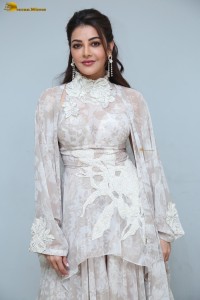 actress Kajal Aggarwal beautiful in a white dress