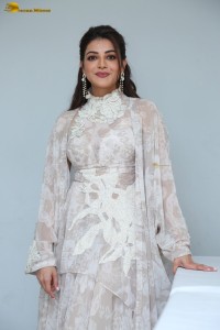 actress Kajal Aggarwal beautiful in a white dress