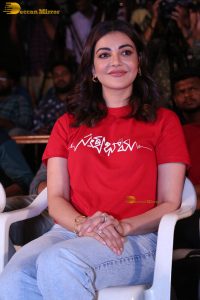actress kajal agarwal cute in a red t-shirt