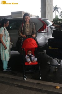 Actress Kajal Aggarwal with husband Gautam Kitchlu and son Neil