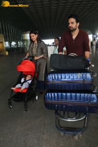 Actress Kajal Aggarwal with husband Gautam Kitchlu and son Neil