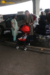 Actress Kajal Aggarwal with husband Gautam Kitchlu and son Neil