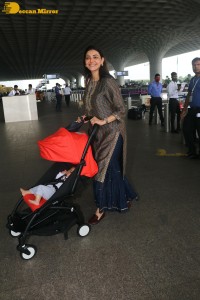 Actress Kajal Aggarwal with husband Gautam Kitchlu and son Neil
