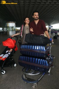 Actress Kajal Aggarwal with husband Gautam Kitchlu and son Neil