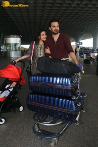 Actress Kajal Aggarwal with husband Gautam Kitchlu and son Neil