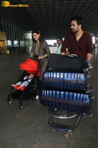 Actress Kajal Aggarwal with husband Gautam Kitchlu and son Neil