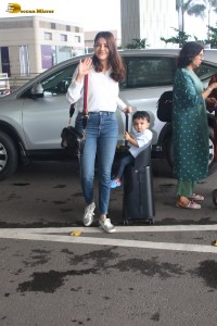 Actress Kajal Aggarwal and her son Neil were spotted traveling from Mumbai Airport