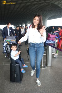 Actress Kajal Aggarwal and her son Neil were spotted traveling from Mumbai Airport