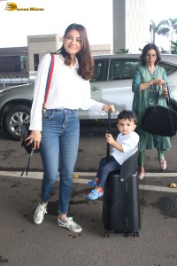 Actress Kajal Aggarwal and her son Neil were spotted traveling from Mumbai Airport