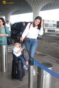 Actress Kajal Aggarwal and her son Neil were spotted traveling from Mumbai Airport