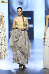 Bollywood actress Kalki Koechlin doing a ramp walk at a fashion show