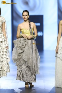 Bollywood actress Kalki Koechlin doing a ramp walk at a fashion show