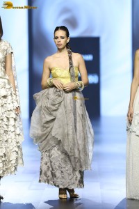 Bollywood actress Kalki Koechlin doing a ramp walk at a fashion show
