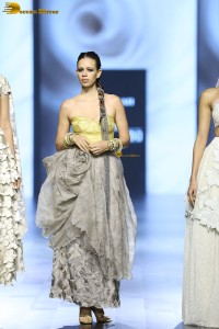 Bollywood actress Kalki Koechlin doing a ramp walk at a fashion show