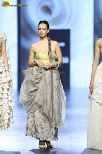 Bollywood actress Kalki Koechlin doing a ramp walk at a fashion show