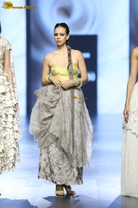 Bollywood actress Kalki Koechlin doing a ramp walk at a fashion show