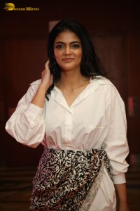 Indian Actress Kalpika Ganesh in a white shirt