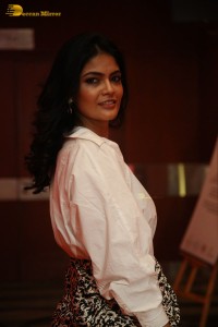 Indian Actress Kalpika Ganesh in a white shirt