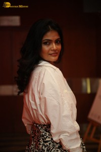 Indian Actress Kalpika Ganesh in a white shirt
