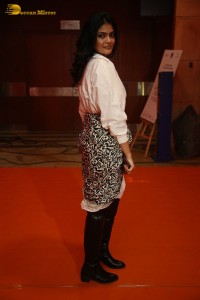 Indian Actress Kalpika Ganesh in a white shirt